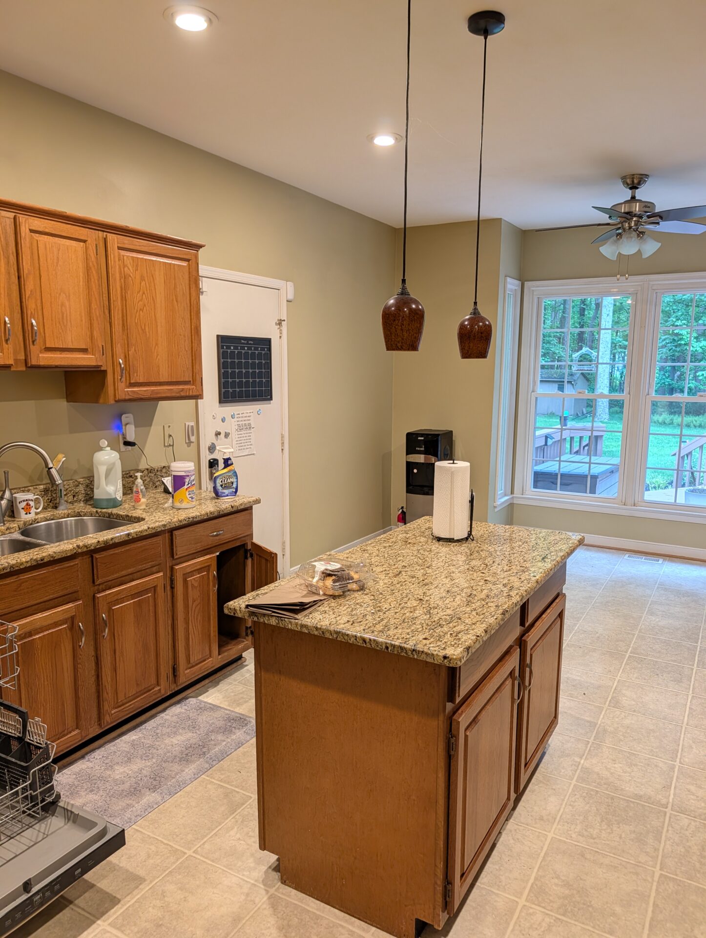Original kitchen sink run and small oak island before demolition, Montgomery County kitchen remodel